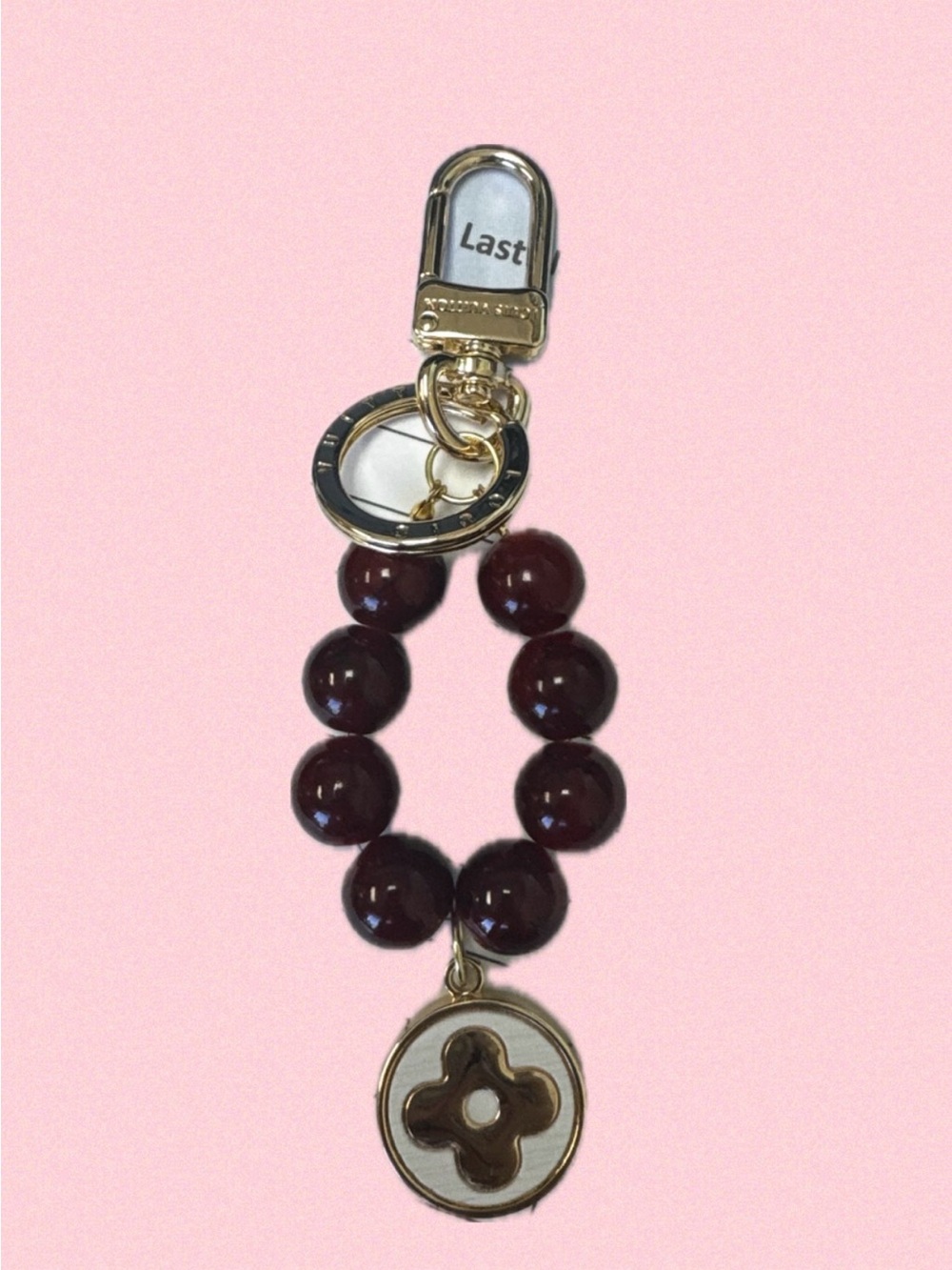 Gold-Tone Red Beaded Keychain with Medallion